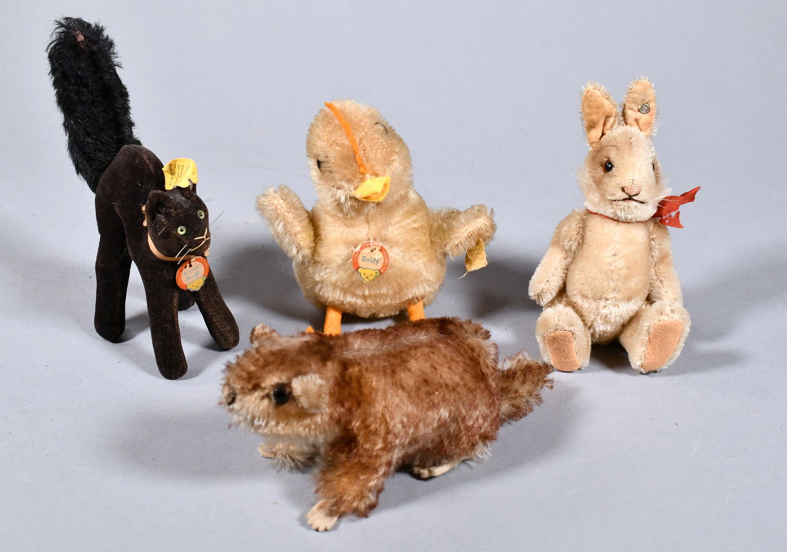 FOUR DIMINUTIVE STEIFF ANIMALS. (1 of 14)