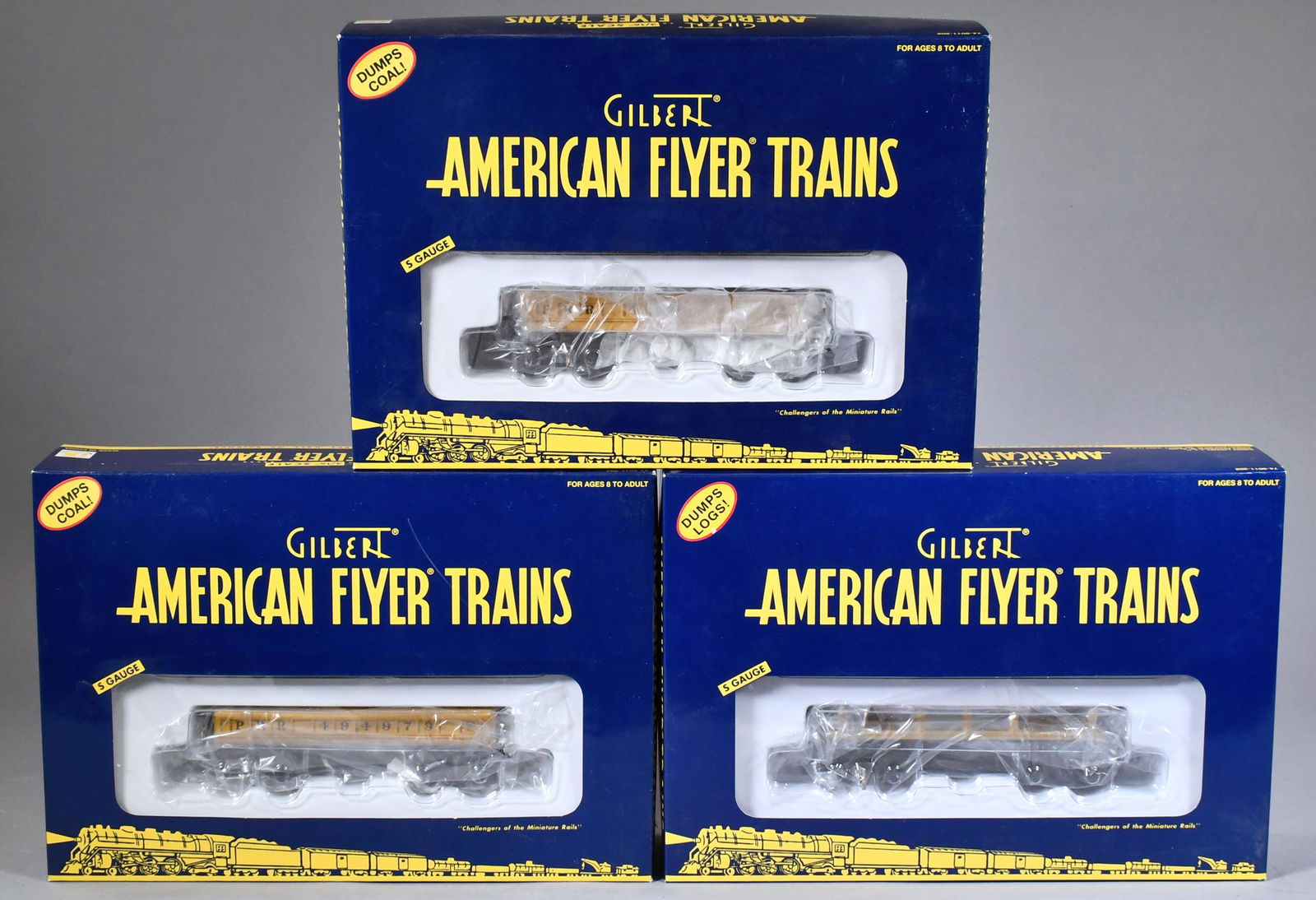 AMERICAN FLYER LOG DUMP CAR SET AND COAL DUMP CARS. (1 of 2)