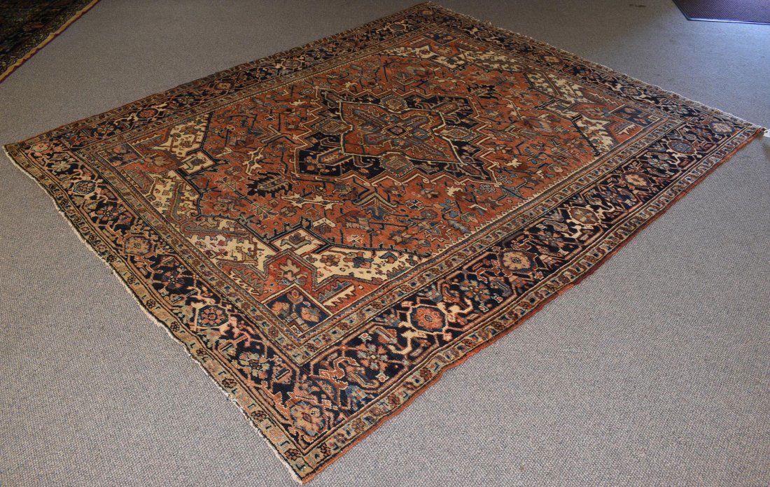 ANTIQUE PERSIAN HERIZ ROOMSIZE RUG. (1 of 4)