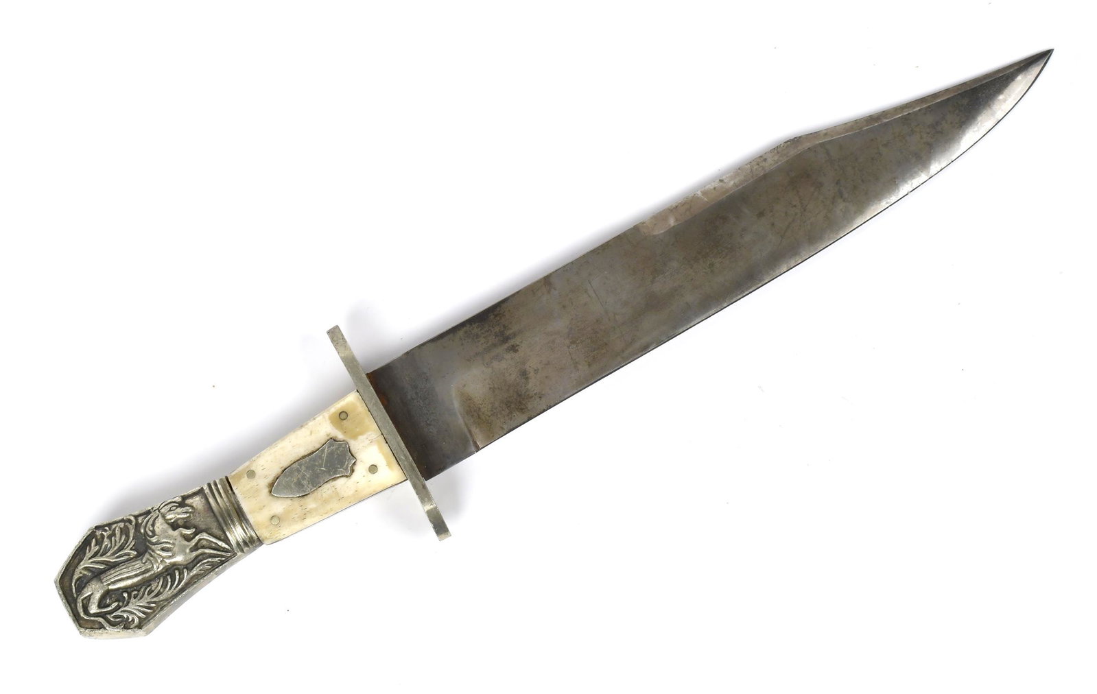 19TH C. ENGLISH BOWIE KNIFE.: Late 19th century English Bowie knife with iron blade marked G. Woodhead Howard St. Sheffield, with handle in bone and nickel plate depicting an alligator with a horse's head, 14”L.