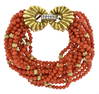 FRENCH 18K GOLD, DIAMOND AND CORAL BRACELET.