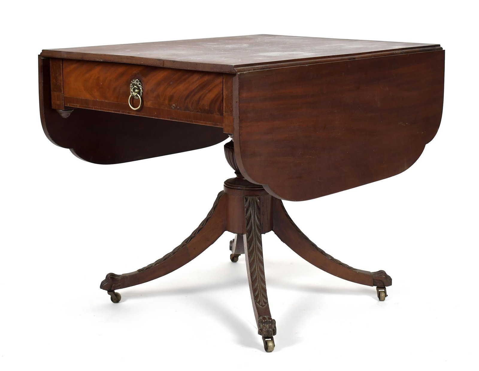 FEDERAL NY PHYFE SCHOOL CARVED BREAKFAST TABLE.: Ca. 1820 mahogany breakfast table, attributed to Duncan Phyfe workshop, with rich mahogany top, and shaped drop leaves, a single drawer with period lions head brass, reeded urn pedestal, acanthus carv