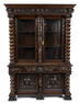 ANTIQUE HEAVILY CARVED EUROPEAN CABINET.