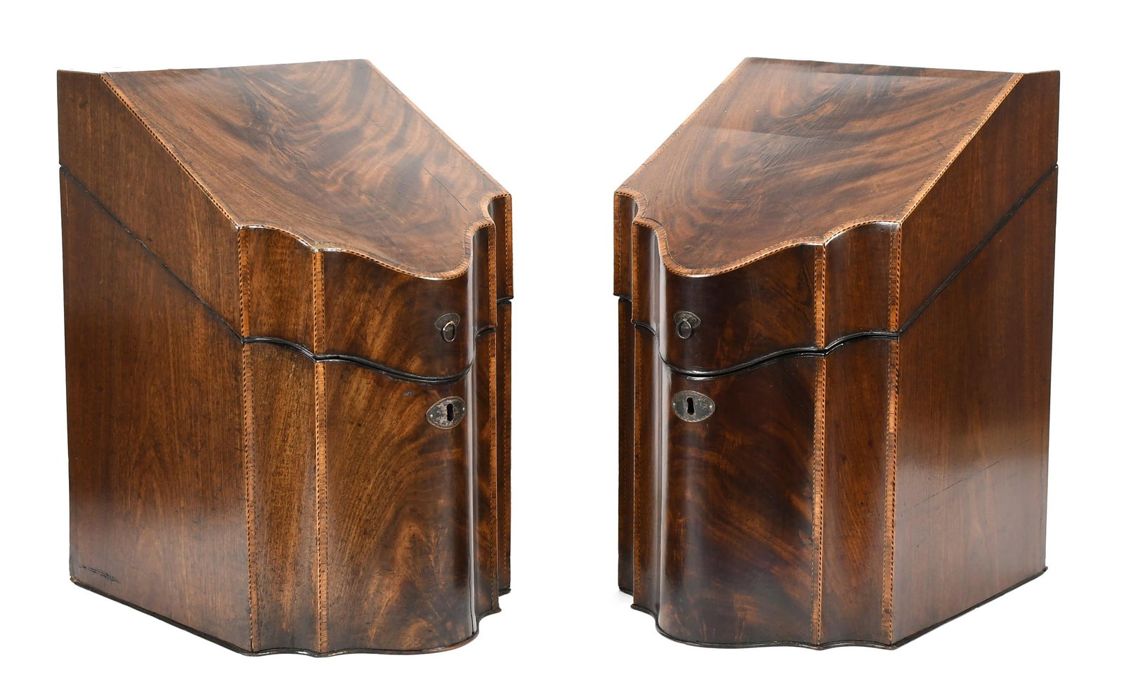 ENGLISH GEORGE III KNIFE BOXES CA. 1800.: A fine matched pair of English Georgian mahogany knife boxes with hinged lift tops, and a line inlaid fitted interior, scalloped fronts with banded inlays. 14.5”H x 9”D x 11”D.