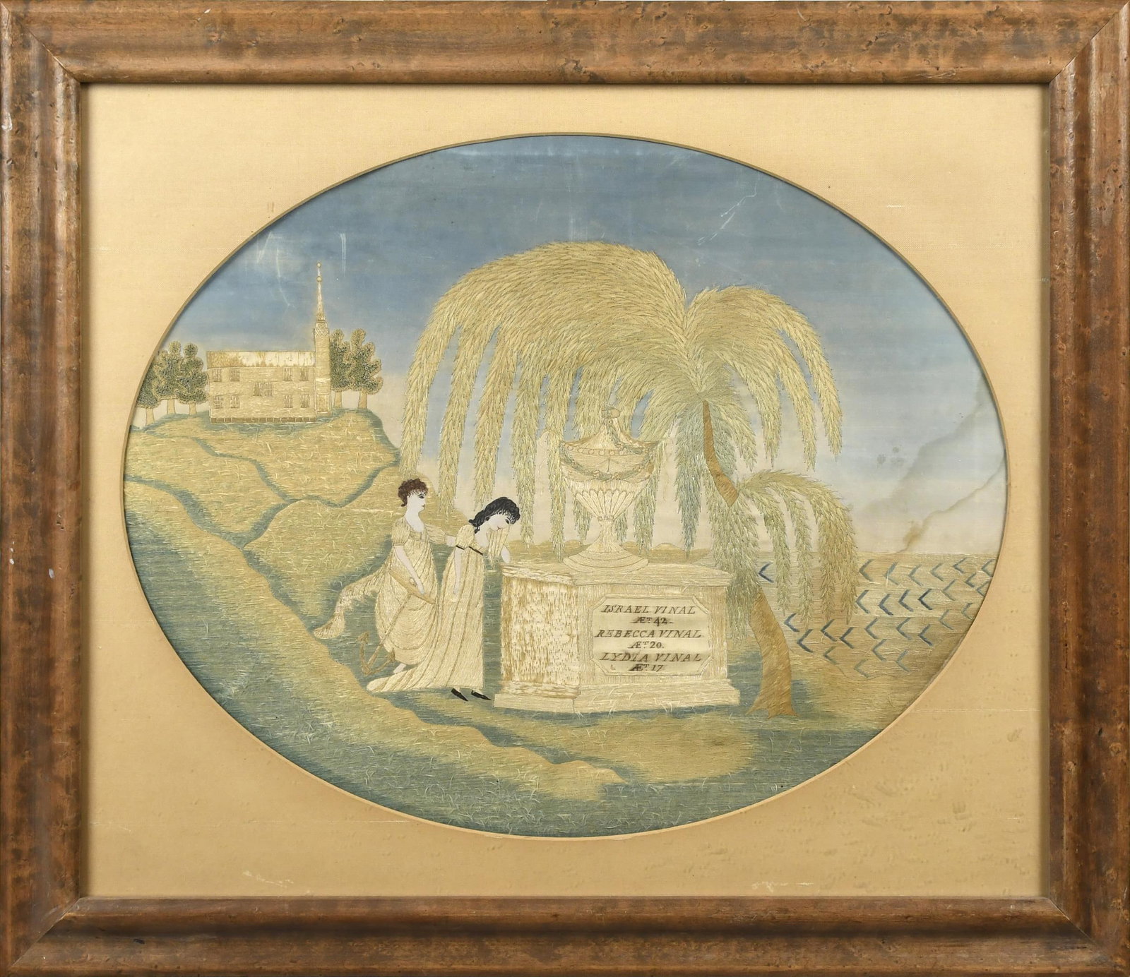 19TH C. EMBROIDERED SILK MORNING SCENE, VINAL FAMILY.: Oval form silk thread embroidery on silk ground, scene depicting the Vinal Family (Isreal, Rebecca, and Lydia) grave site with tombstone, mourning figures among a landscape with willow tree and church
