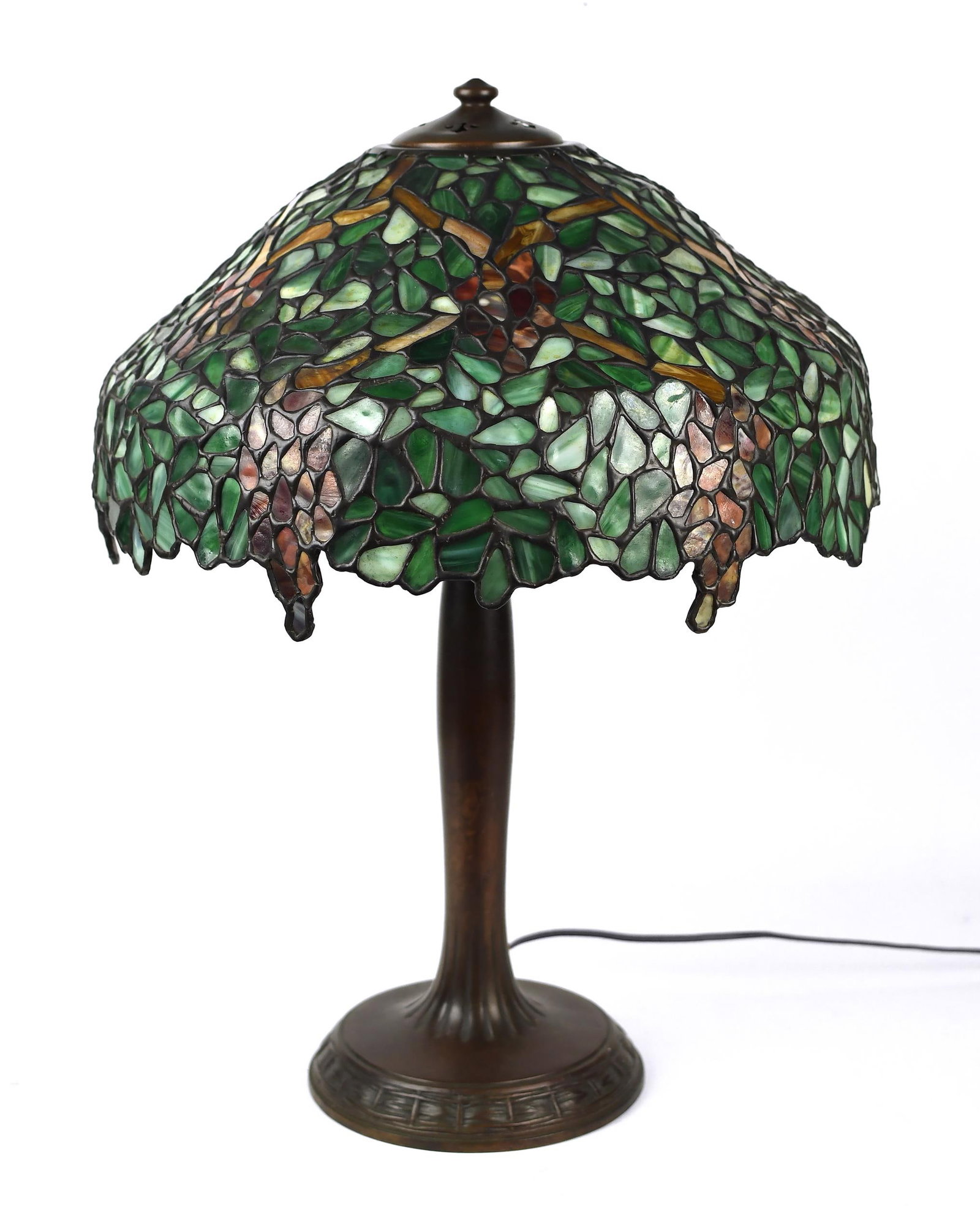 ANTIQUE HANDEL LEADED GLASS TABLE LAMP.: Early 20th C., floral leaded glass shade, signed Handel, 17” dia., with a patinated base, 23”H