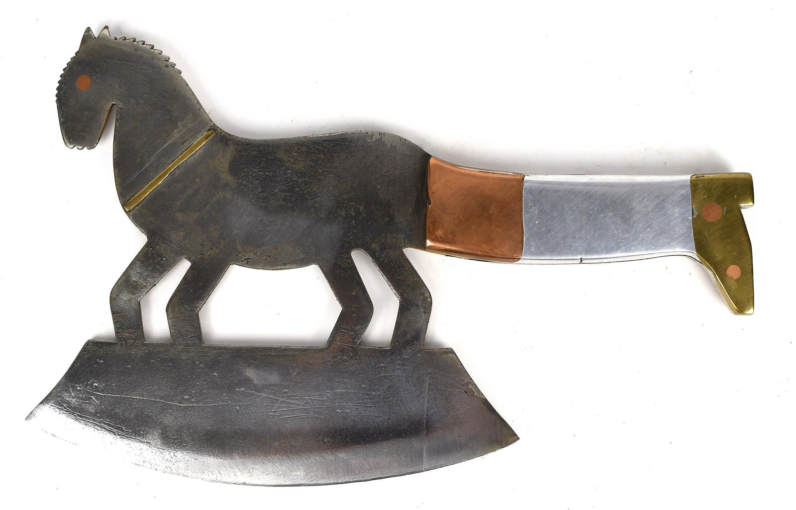 19TH C. FRENCH HORSE FORM FOOD CHOPPER.: Ca. 1840 French food chopper, polished iron blade in the form of a horse with copper eyes and a brass harness, with a horn, brass and copper handle, 12”L.