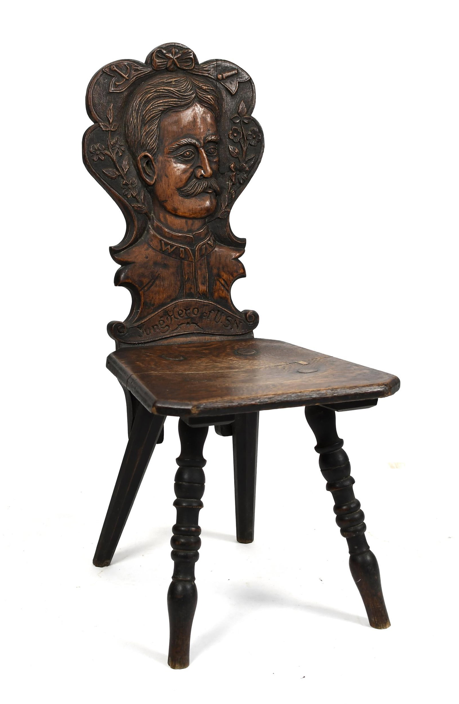 ANTIQUE FOLK ART CARVED OAK USN CHAIR.: Ca. 1880-90’s, oak chair with figural back carved with portrait of a man surrounded by ribbon, floral and anchor motifs and inscription 'Yung Hero of U.S.N.', on turned legs with through tenon const
