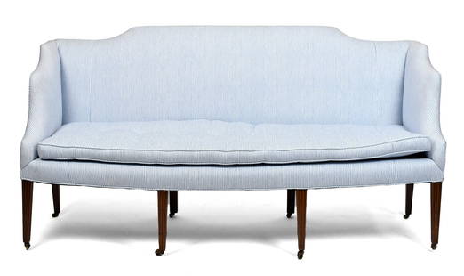 EARLY 19TH C. FEDERAL REEDED LEG SOFA.: Early 19th C. Federal sofa on eight square tapered mahogany legs, four front legs reeded, with casters, upholstered in blue striped fabric with a single removable seat cushion. 37”H x 72.5”