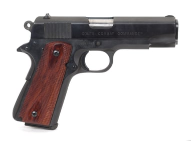 COLT 1911 COMBAT COMMANDER 45 CAL. PISTOL.