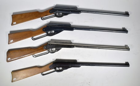 FOUR VINTAGE BUZZ BARTON BB GUNS.