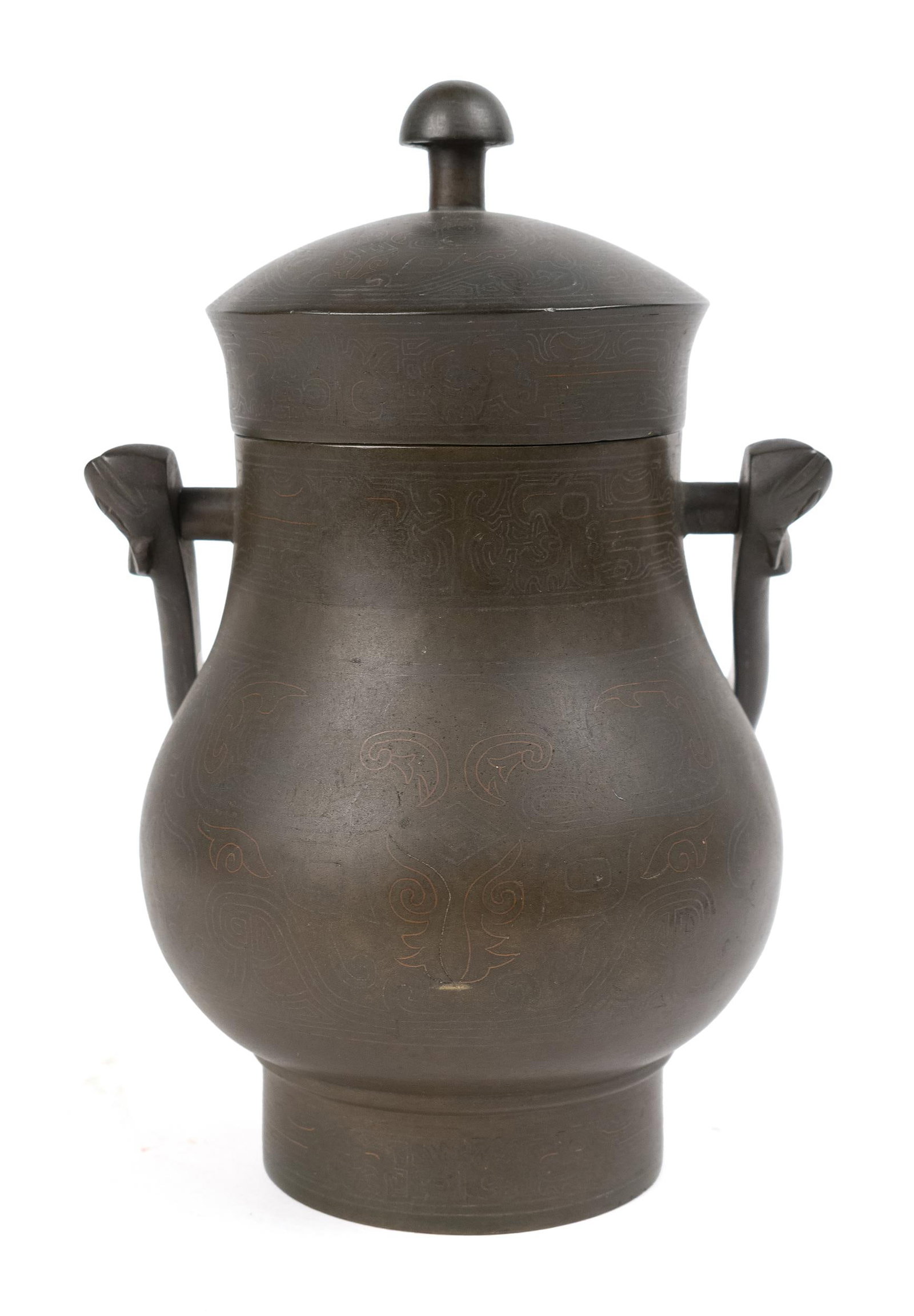 CHINESE MING DYNASTY INLAID BRONZE WINE VESSEL.: A signed Ming period Chinese covered bronze and handled wine vessel, with inlaid copper and silver wire. Signed on underside of lid. 8”H handle down x 9”H handle up.