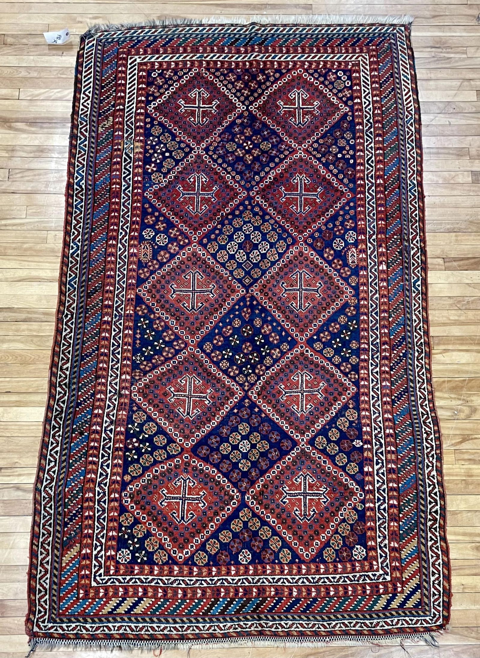 ANTIQUE ORIENTAL SCATTER RUG. (1 of 5)