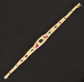 18K GOLD BRACELET W/ GEMSTONES & DIAMONDS.