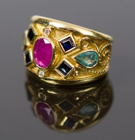 18K GOLD RUBY, SAPPHIRE, EMERALD & DIAMOND RING.