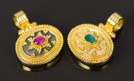 TWO 18K YELLOW GOLD ETRUSCAN REVIVAL STYLE PENDANTS.