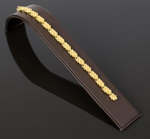 18K YELLOW GOLD FROG BRACELET.