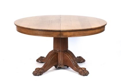 CARVED VICTORIAN OAK PEDESTAL BASE DINING TABLE.