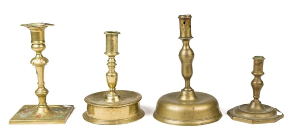 FOUR 18TH C. BRASS CANDLESTICKS.