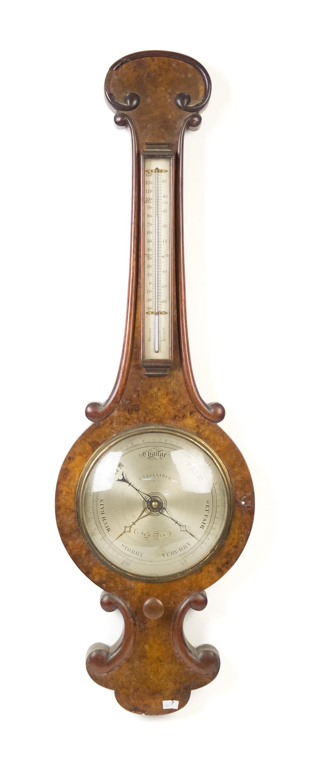 ANTIQUE G. TAGLIABUE BURL WOOD BAROMETER.: Antique G. Tagliabue New York burl wood barometer, with metal dial, mercury filled. 36.5”H x 10.5” dia..