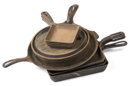 NINE VINTAGE GRISWOLD CAST IRON PANS.