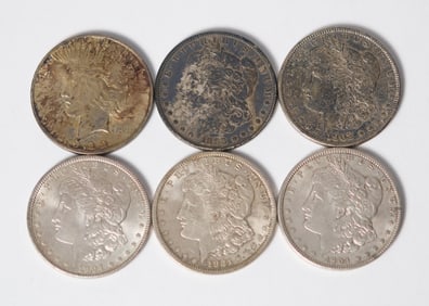 SIX AMERICAN SILVER DOLLAR COINS, MORGAN AND PEACE.