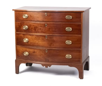 EARLY 19TH C. CHERRY BOWFRONT CHEST.