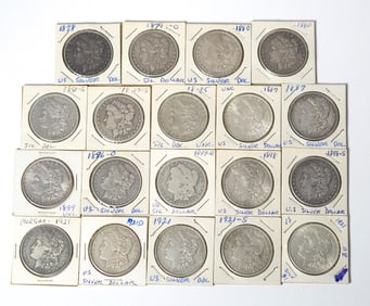 19 ASSORTED MORGAN SILVER DOLLARS.