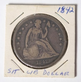 MID 19TH C. SEATED SILVER DOLLAR.