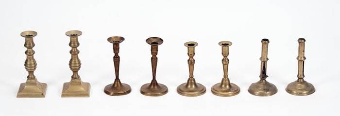 FOUR PAIRS OF ANTIQUE BRASS CANDLESTICKS, 1 OF 2.