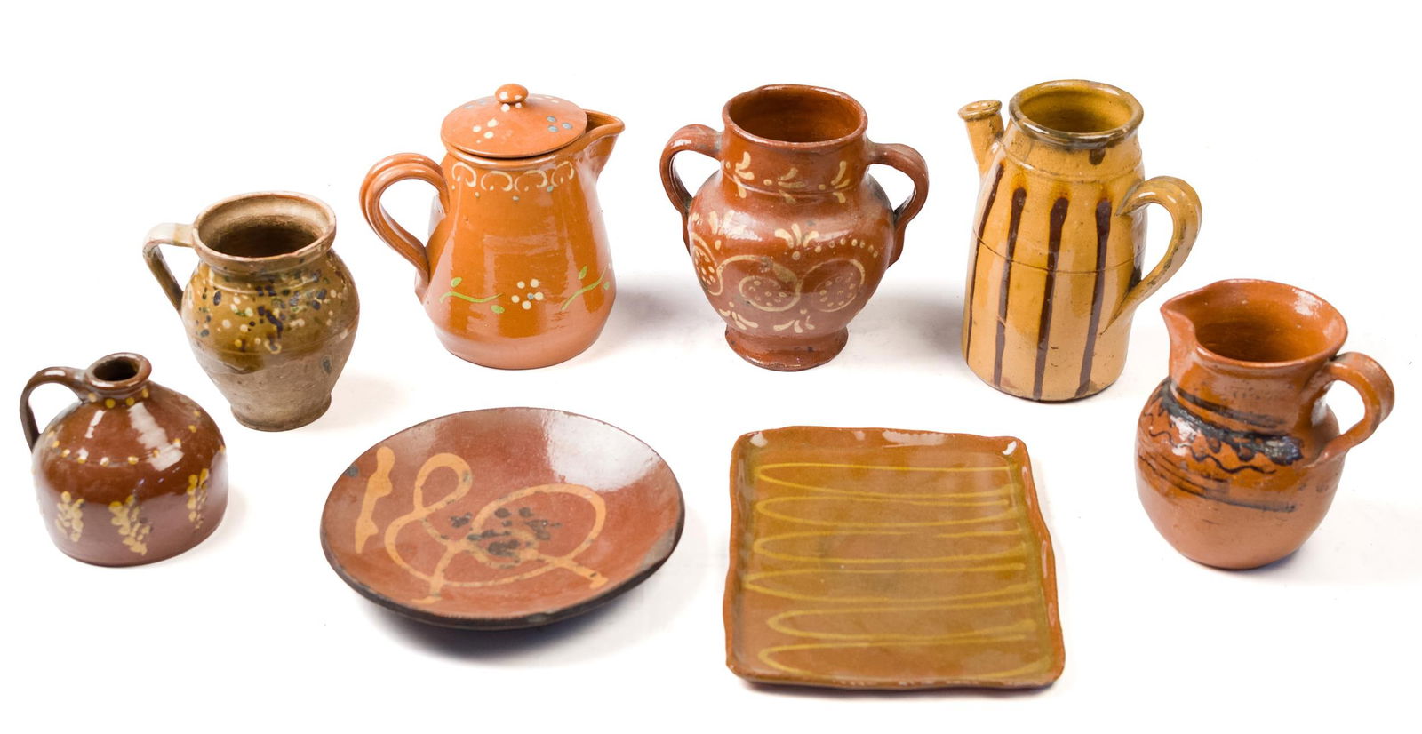 ANTIQUE REDWARE, EIGHT PIECES.: Nine various vintage and antique redware pieces, including; six vessels/jars ranging in height from 4”H to 7.5”H, and two plates, 8.5” dia and 9.5”W.