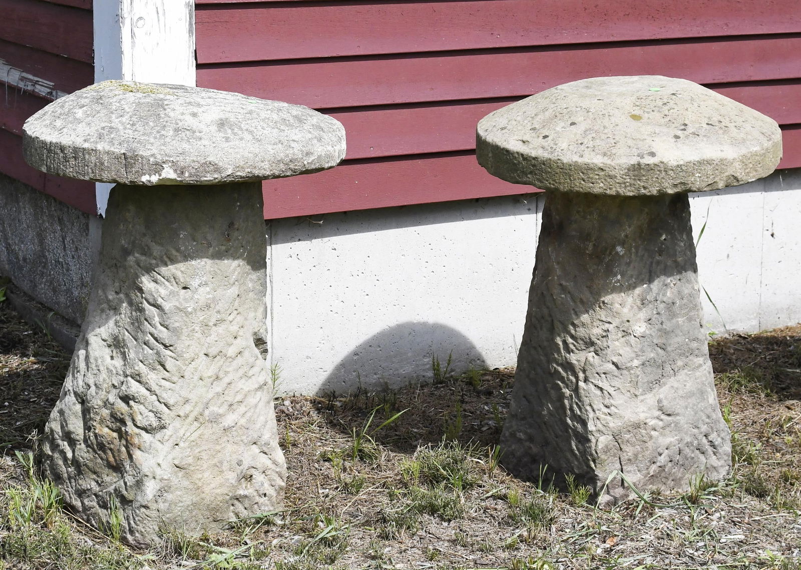 TWO 18TH C. CARVED STADDLE STONES. (1 of 12)