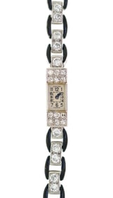 CARTIER ART DECO DIAMOND & BLACK ENAMEL WRIST WATCH.