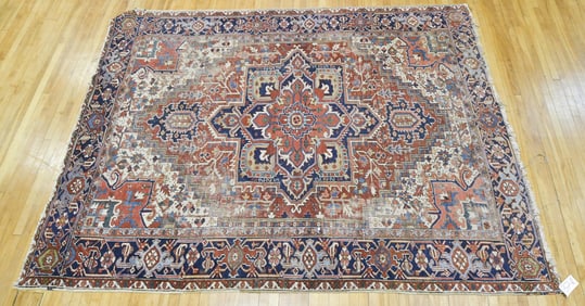 ANTIQUE ORIENTAL HERIZ ROOM SIZED RUG.