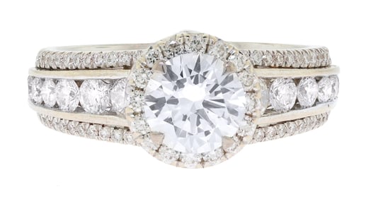 18K GOLD HALO 1.22 CT. DIAMOND RING.