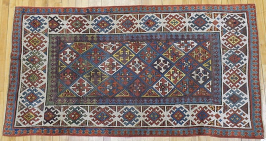 ANTIQUE ORIENTAL SCATTER RUG.