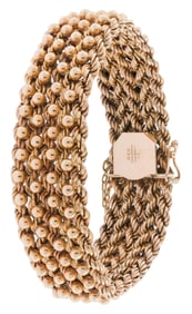 18K GOLD WOVEN BRACELET.