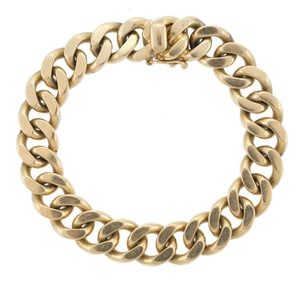 14K GOLD CURB BRACELET.
