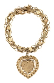VINTAGE 14K GOLD CHARM BRACELET WITH HEART.