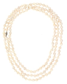 SALTWATER ROPE LENGTH PEARL NECKLACE W/ GOLD CLASP.