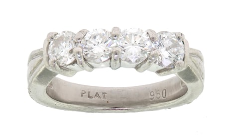 PLATINUM & FOUR STONE DIAMOND WEDDING BAND.