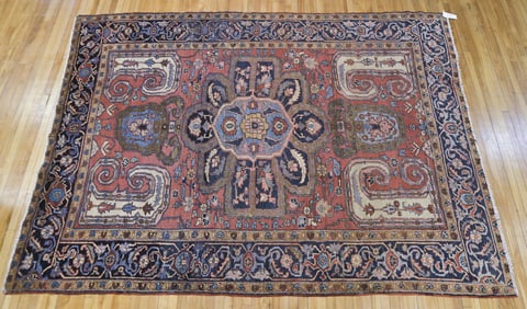 ANTIQUE HERIZ ROOM SIZE RUG.