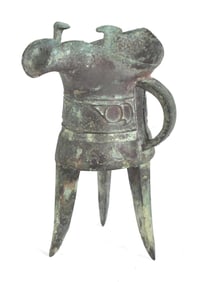A CHINESE SHANG DYNASTY BRONZE JUE CUP.