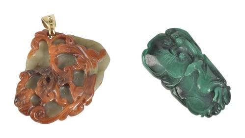 TWO CARVED CHINESE JADE PENDANTS.