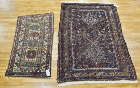 TWO ANTIQUE ORIENTAL AREA RUGS.