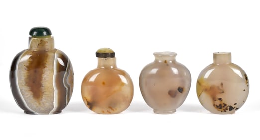 FOUR HARDSTONE SNUFF BOTTLES.