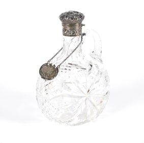 STERLING AND CUT GLASS DECANTER.