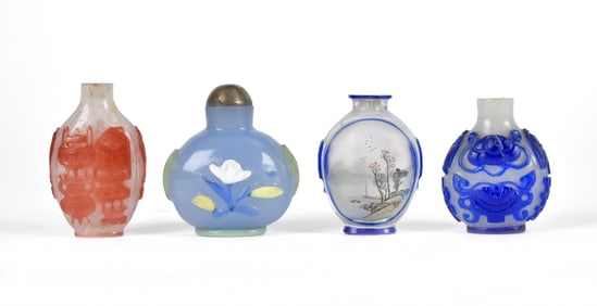 FOUR PEKING GLASS SNUFF BOTTLES.