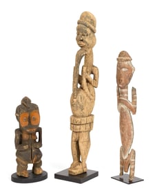 THREE AFRICAN FIGURAL WOOD CARVINGS.