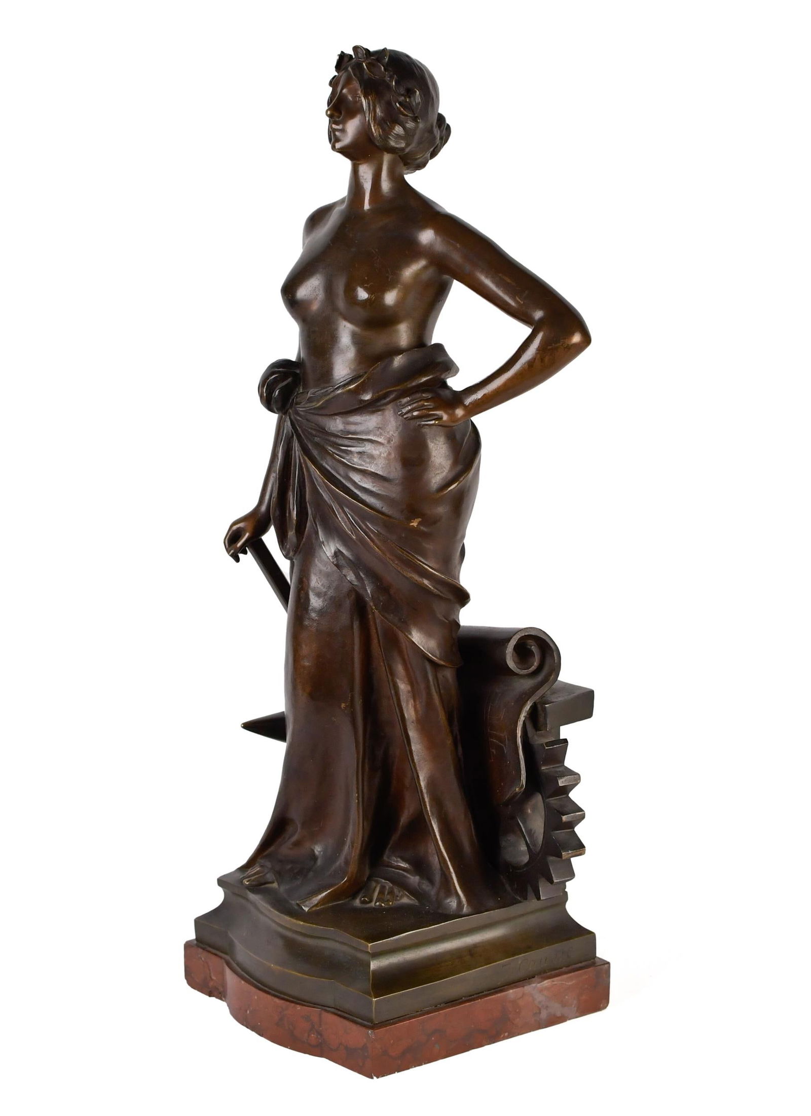 JULIEN CAUSSE BRONZE, INDUSTRY.: Julien Causse (1869-1914) bronze sculpture, nude female with hammer, anvil, and large gear, a figural depiction of Industry, Signed on base J. Causse. Mounted on a red marble base. 24.5”H x 9